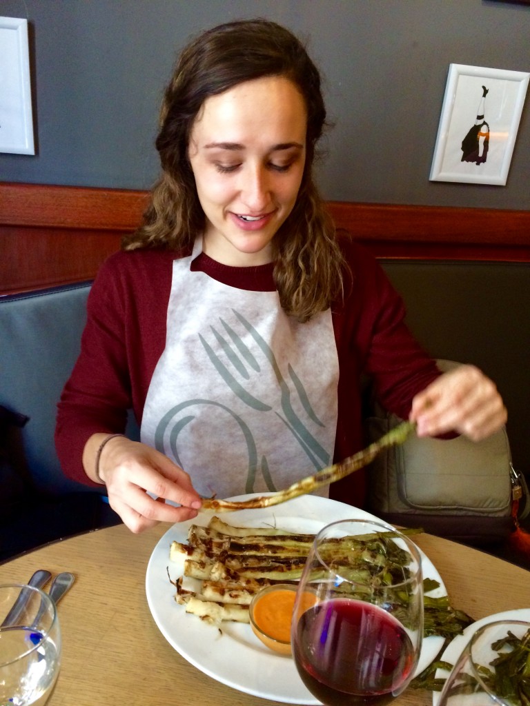Cristina eating calcots at Trobador Ferran